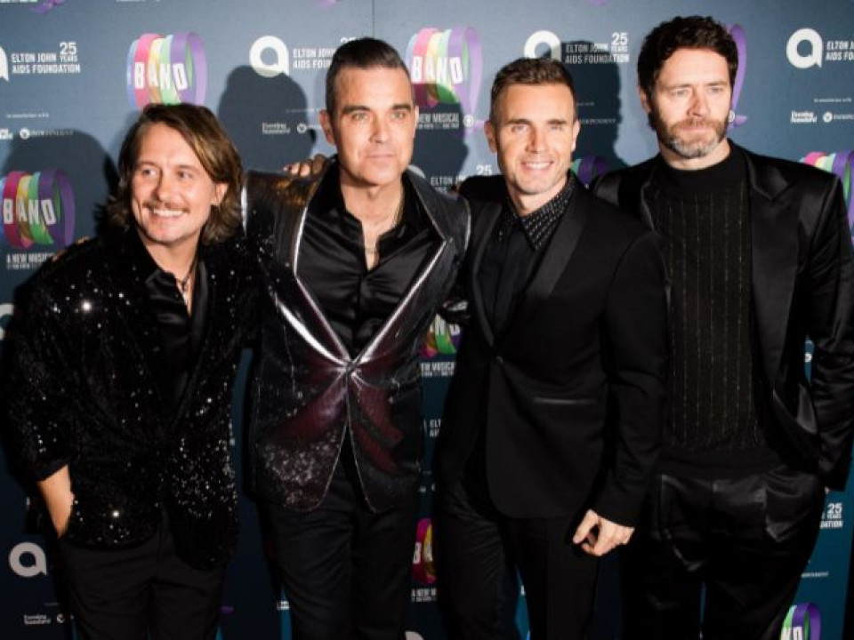 Robbie Williams şi Take That cântă împreună într-un concert special 