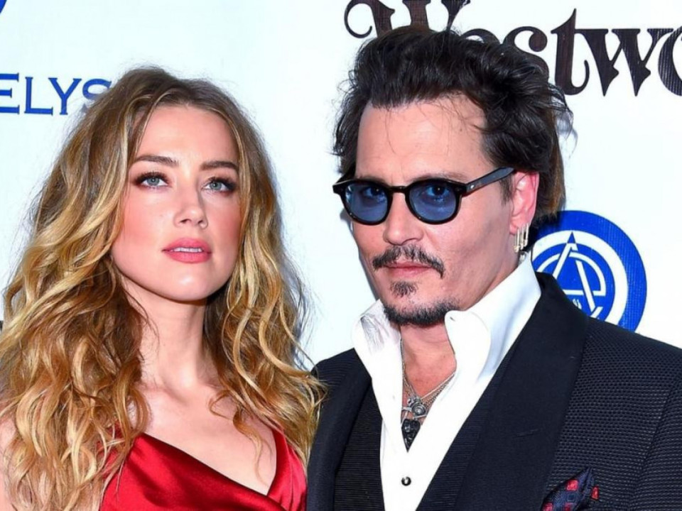 Johnny Depp a câştigat procesul de defăimare împotriva fostei soţiei, Amber Heard